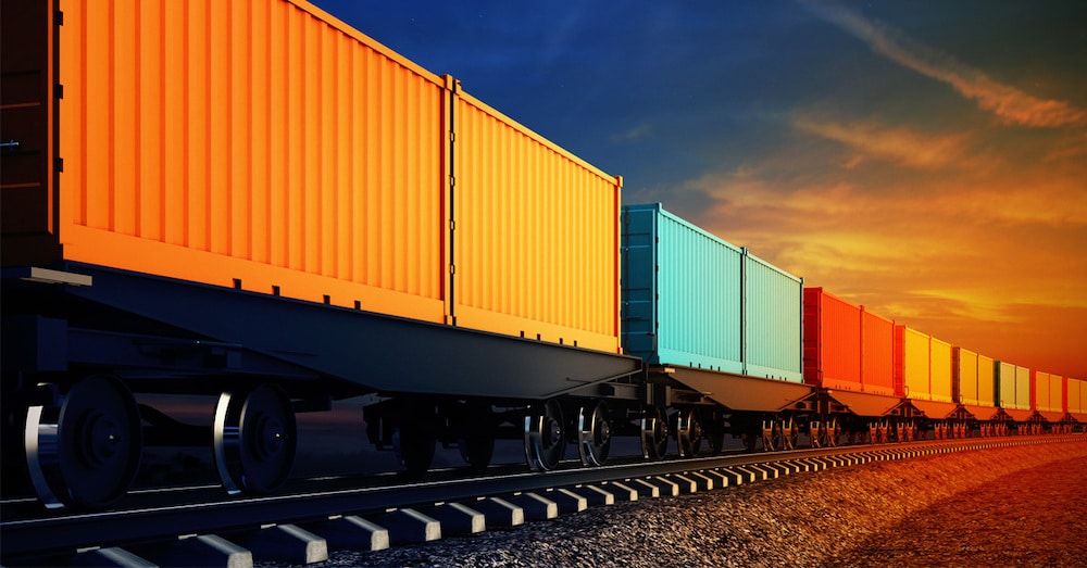 Wagon of freight trains with containers against a sky background